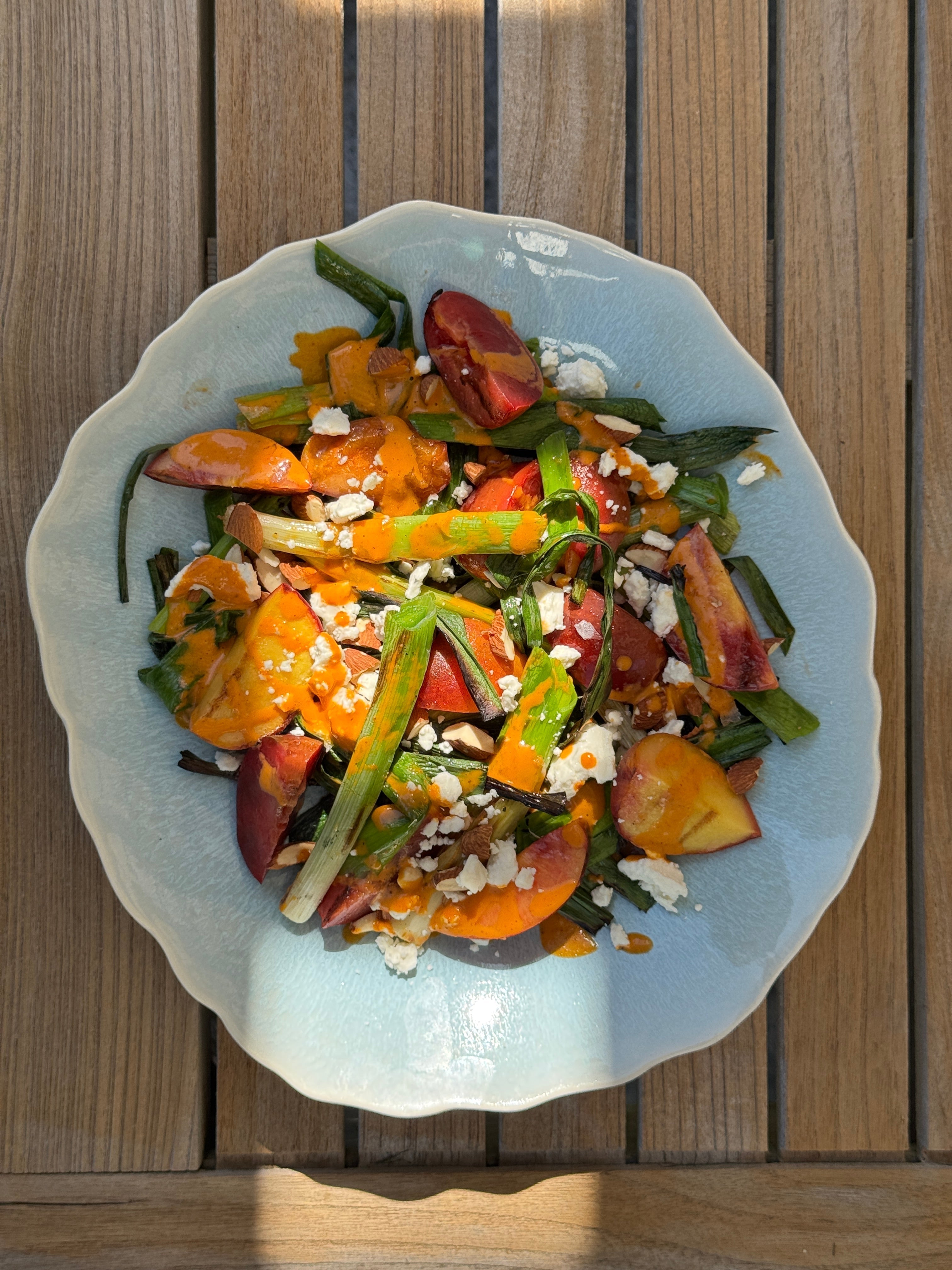 Grilled Sweet Garleek & Stone Fruit Salad with Honey-Harissa Vinaigrette