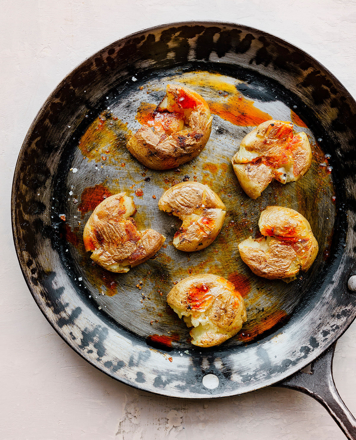 Smashed Upstate Abundance Potatoes with Chili Oil